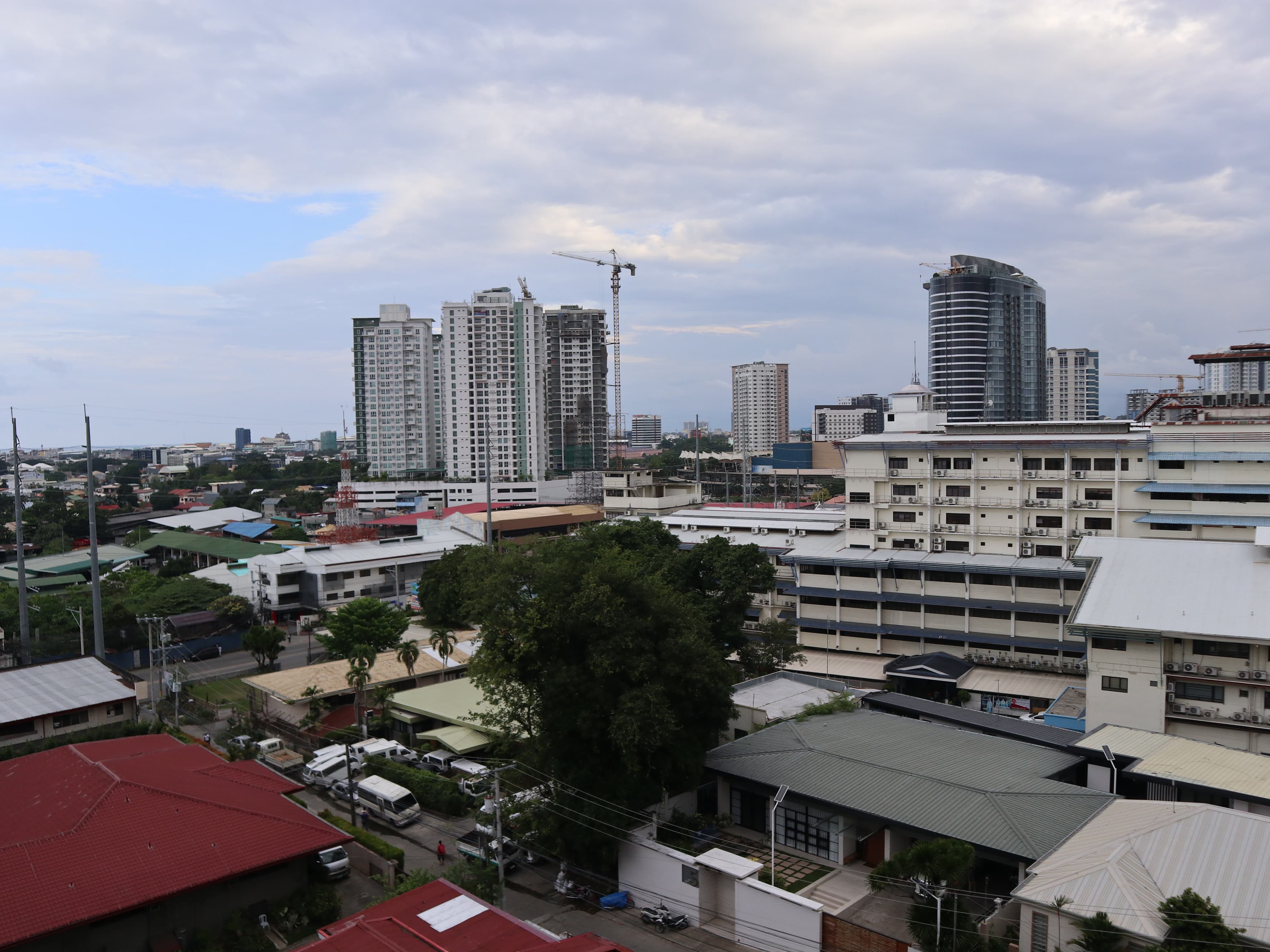 Davao City skyline seen from Bajada, with Mt. Apo in the distance